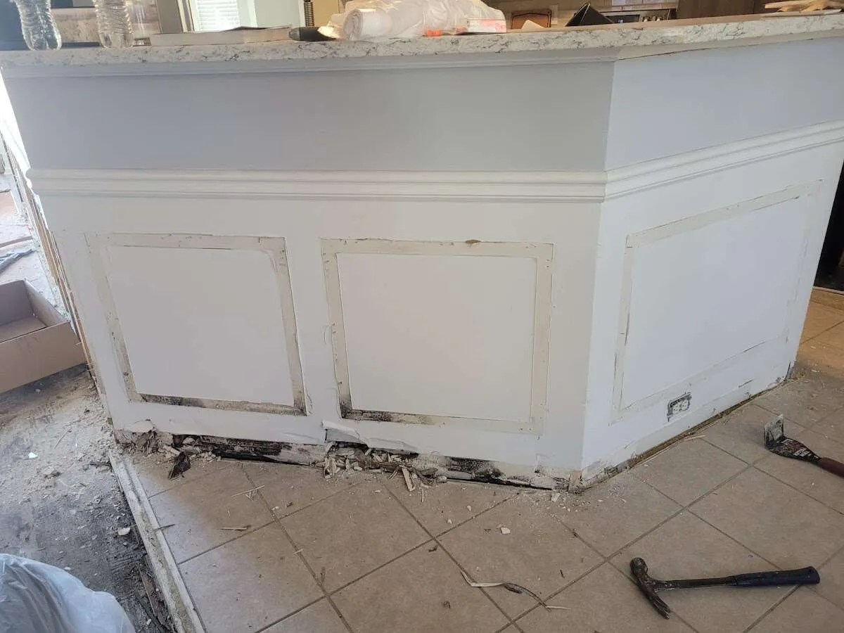 Water damage and mold on kitchen during Storm Damage Restoration in Alpine